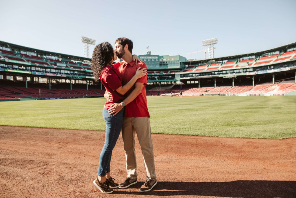 Couple embracing during their Boston engagement photos