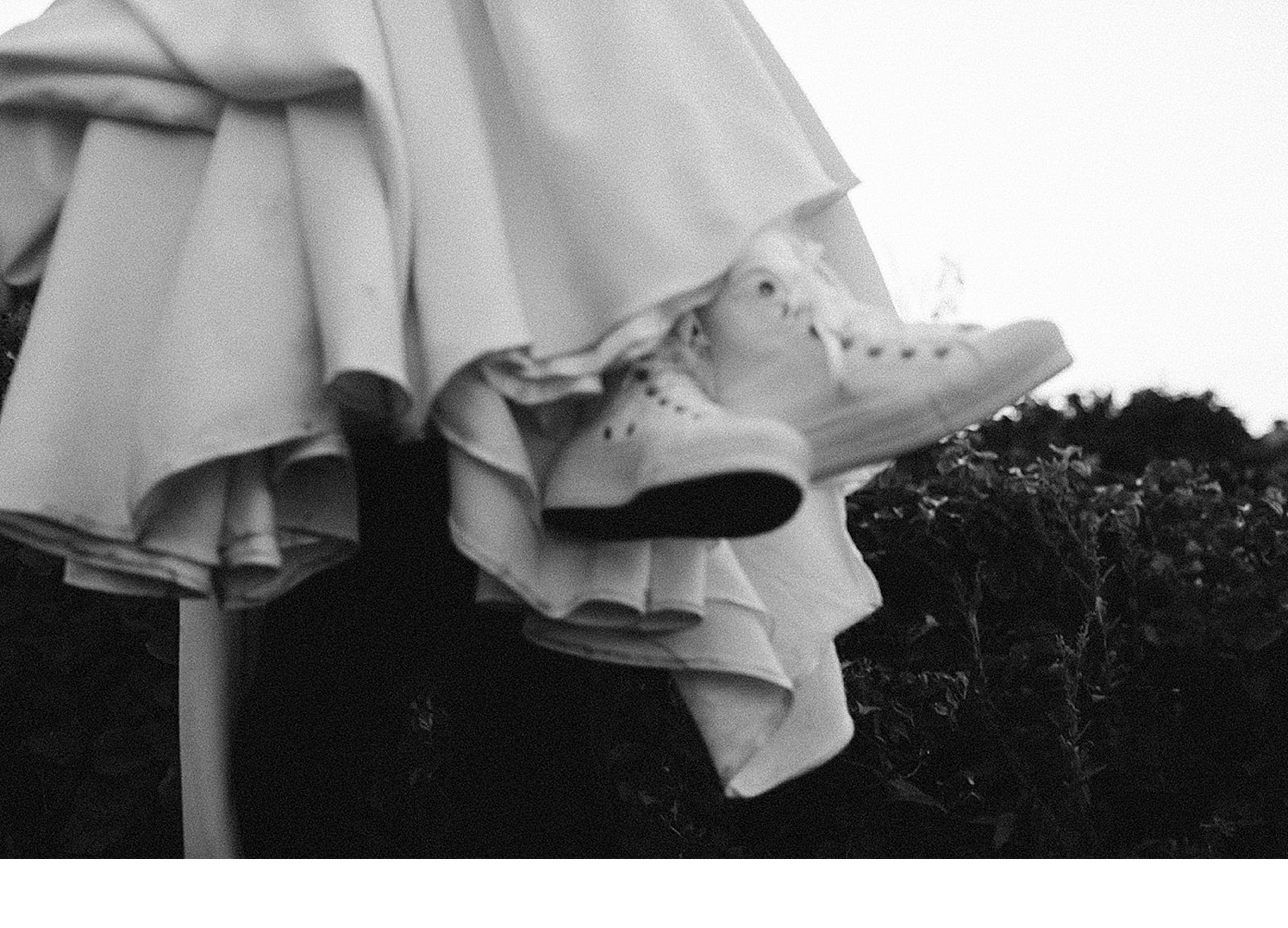 Wedding-dress-with-white-chuck-taylors.