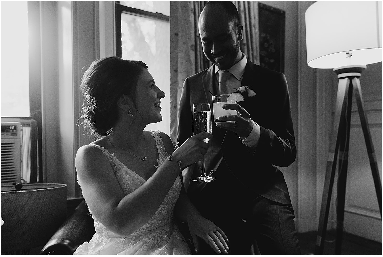 Couple-toasting-at-wedding-at-Moraine-Farm