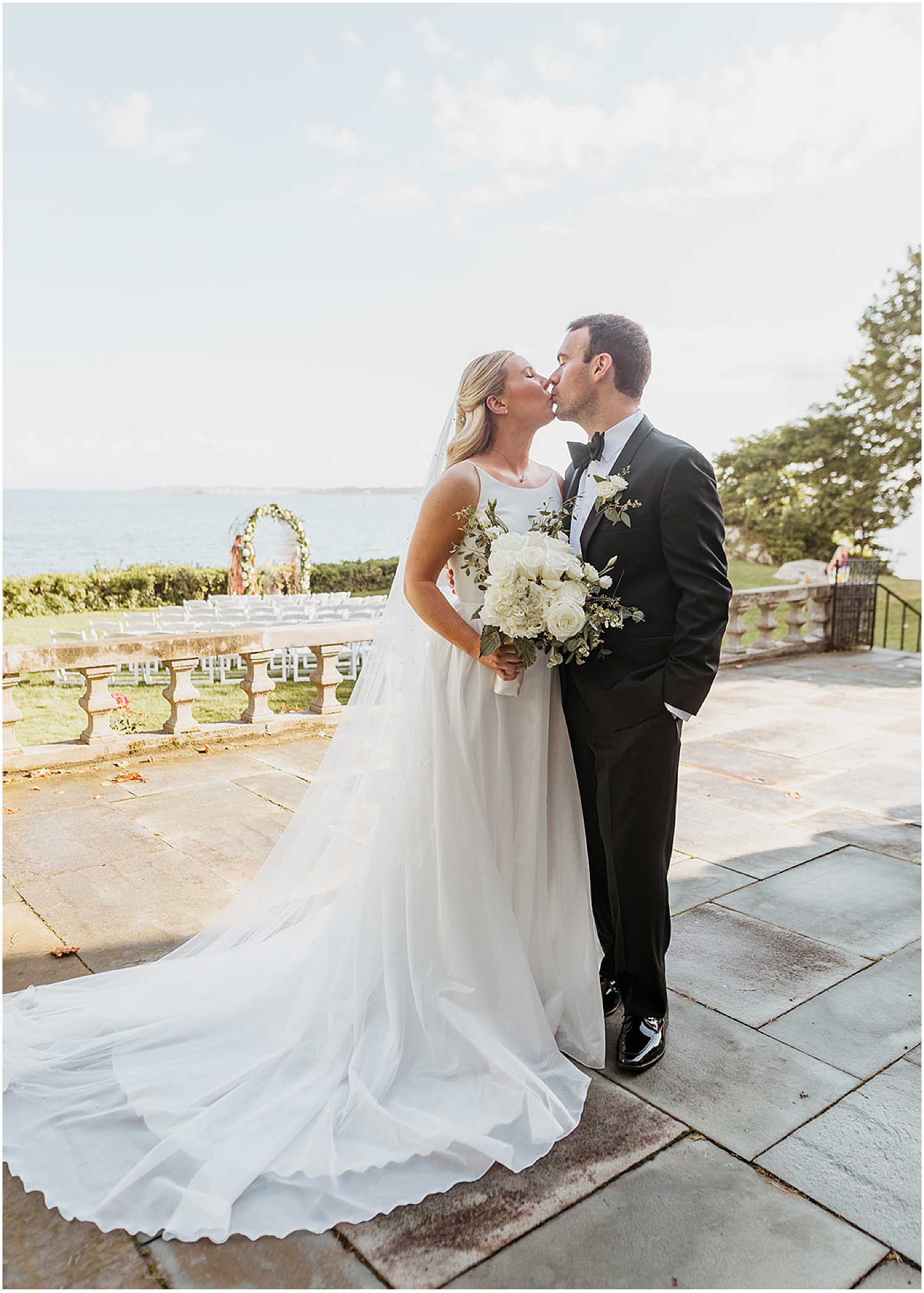 Bride and groom kissing at the Misselwood Estate at Endicott in Beverly
